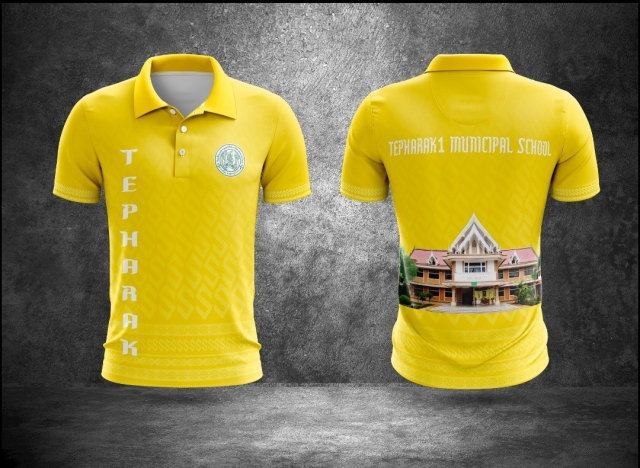 แบบเสื้อโปโลสีเหลือง พิมพ์ลายกราฟิกไทยและรูปอาคารเรียน โรงเรียนเทศบาล 1 เทพารักษ์